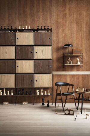 Verschiedene Furniere bzw. Farbtöne wurden hier geschickt miteinander kombiniert. Foto: String Furniture